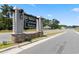 Welcoming entrance to Calabash Station with a beautifully designed community sign and landscaping at 1222 Nw Calabash Station Blvd., Calabash, NC 28467