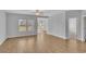 Bright living room with hardwood floors and large windows at 1222 Nw Calabash Station Blvd., Calabash, NC 28467