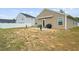 Spacious backyard with a cozy patio perfect for outdoor relaxation and entertainment at 115 Foxford Dr., Conway, SC 29526
