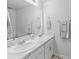Bathroom features a double sink vanity with modern fixtures, bright lighting and towel racks at 115 Foxford Dr., Conway, SC 29526