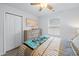 A comfortable bedroom with a ceiling fan, a large window, and a neutral color palette at 115 Foxford Dr., Conway, SC 29526