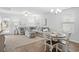 Inviting living and dining areas featuring plush seating, natural light, and a modern aesthetic at 115 Foxford Dr., Conway, SC 29526