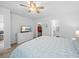 Cozy primary bedroom with a ceiling fan, ensuite bathroom, and generous closet space at 115 Foxford Dr., Conway, SC 29526