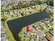 Aerial view of community shows the house with beautiful lake view at 1154 Lampwick Ln., Murrells Inlet, SC 29576