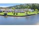 Well-maintained backyard with lawn and lake views at 1154 Lampwick Ln., Murrells Inlet, SC 29576