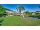 Landscaped backyard and lawn with lake views at 1154 Lampwick Ln., Murrells Inlet, SC 29576