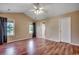 Spacious bedroom with vaulted ceiling, hardwood floors, and two bright windows at 1154 Lampwick Ln., Murrells Inlet, SC 29576
