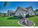 Landscaped yard with views of the home's exterior at 1154 Lampwick Ln., Murrells Inlet, SC 29576