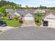 Charming single Gathering home with a well-manicured lawn and attached two-car garage at 1154 Lampwick Ln., Murrells Inlet, SC 29576