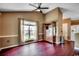 Comfortable living room with hardwood floors, a window, and open access to other areas at 1154 Lampwick Ln., Murrells Inlet, SC 29576