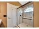 Shower featuring a glass door, shower head, and built-in shelves at 1154 Lampwick Ln., Murrells Inlet, SC 29576