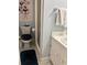 Bright bathroom featuring a toilet, shower, vanity, and a blue color scheme at 116 Green Lake Dr., Myrtle Beach, SC 29572