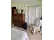 Bedroom with a chair, luggage, tall dresser, and mirrored closet doors at 116 Green Lake Dr., Myrtle Beach, SC 29572