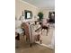 Cozy living room features patterned furniture, neutral walls, and an elegant mirror at 116 Green Lake Dr., Myrtle Beach, SC 29572