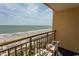 Balcony view overlooking the beach with beach chairs and a seaside atmosphere at 1200 N Ocean Blvd. N # 905, Myrtle Beach, SC 29577