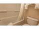 This bathroom features a shower and tub combo with tiled walls and a toilet with mounted towel rack at 1200 N Ocean Blvd. N # 905, Myrtle Beach, SC 29577