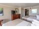 Cozy hotel room featuring two beds, a dresser with a television, and a kitchenette at 1200 N Ocean Blvd. N # 905, Myrtle Beach, SC 29577