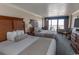 Comfortable hotel room with two beds, a TV, and a balcony overlooking the ocean at 1200 N Ocean Blvd. N # 905, Myrtle Beach, SC 29577