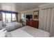 Welcoming hotel room with two beds, a television, and a balcony providing ocean views at 1200 N Ocean Blvd. N # 905, Myrtle Beach, SC 29577