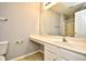 Bathroom featuring a large mirror, sink with ample counter space, and walk-in shower at 121 Olde Towne Way # 2, Myrtle Beach, SC 29588