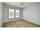 Bedroom with two sunny windows that allow in plenty of natural light at 121 Olde Towne Way # 2, Myrtle Beach, SC 29588