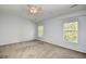 Spacious bedroom features a ceiling fan and two windows with lots of natural light at 121 Olde Towne Way # 2, Myrtle Beach, SC 29588