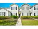 Charming townhome with manicured landscaping, showcasing curb appeal and a welcoming entrance at 121 Olde Towne Way # 2, Myrtle Beach, SC 29588