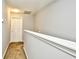 Hallway landing with carpet flooring with access to rooms and a staircase at 121 Olde Towne Way # 2, Myrtle Beach, SC 29588