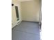 Cozy sunroom with a gray floor and natural light, perfect for relaxing and enjoying the outdoors at 121 Olde Towne Way # 2, Myrtle Beach, SC 29588
