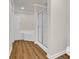 Bright bathroom with a stand-up shower and soaking tub at 129 Old Cedar Loop, Pawleys Island, SC 29585