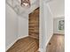 Hallway with hardwood floors and a decorative wood accent wall at 129 Old Cedar Loop, Pawleys Island, SC 29585
