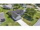Aerial view of the home showcasing its well-maintained lawn, garage, and proximity to the community at 1406 Snowy Egret Dr., Murrells Inlet, SC 29576