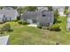 Aerial view of backyard showcasing lawn and mature landscaping at 1406 Snowy Egret Dr., Murrells Inlet, SC 29576