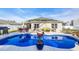 Stunning backyard pool area with outdoor seating and grilling area, perfect for entertaining at 146 Brittmore Park Pl., Myrtle Beach, SC 29588