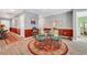 Elegant dining space featuring a glass table, stylish chairs, and decorative accents at 146 Brittmore Park Pl., Myrtle Beach, SC 29588