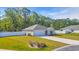 Lovely single-story home featuring a green lawn, concrete driveway, and a convenient attached garage at 146 Brittmore Park Pl., Myrtle Beach, SC 29588