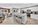 Open kitchen with a center island, stainless steel appliances, and bar stool seating at 146 Brittmore Park Pl., Myrtle Beach, SC 29588