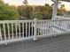 Relax on this spacious balcony with classic white railing and views of the quiet street at 1516 Edge Dr. # 101, North Myrtle Beach, SC 29582
