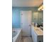 Bright bathroom featuring a bath tub, vanity with lots of space at 1516 Edge Dr. # 101, North Myrtle Beach, SC 29582
