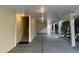Covered carport area with staircase and overhead lighting at 1516 Edge Dr. # 101, North Myrtle Beach, SC 29582