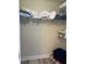 Walk-in closet with wire shelving, providing plenty of space for linens and pillows at 1516 Edge Dr. # 101, North Myrtle Beach, SC 29582