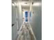 Light and airy hallway featuring wood-look flooring and neutral wall color at 1516 Edge Dr. # 101, North Myrtle Beach, SC 29582