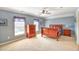 Spacious bedroom with blue walls, multiple windows, and a wooden bed set at 1581 Culbertson Ave., Myrtle Beach, SC 29577
