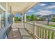 Inviting front porch with a comfortable bench, offering a relaxing outdoor space and neighborhood view at 1581 Culbertson Ave., Myrtle Beach, SC 29577