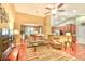 Open-concept living room featuring hardwood floors, ample seating, and seamless kitchen access at 1581 Culbertson Ave., Myrtle Beach, SC 29577
