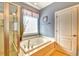 Relaxing main bathroom featuring a soaking tub, a separate shower, and stylish fixtures at 1581 Culbertson Ave., Myrtle Beach, SC 29577