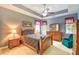 Serene main bedroom with tray ceiling, neutral walls, and ample natural light at 1581 Culbertson Ave., Myrtle Beach, SC 29577