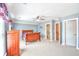 Large main bedroom with blue walls and a bathroom ensuite at 1581 Culbertson Ave., Myrtle Beach, SC 29577
