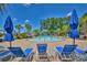 Outdoor splash park featuring a zero-entry pool, umbrellas, and lounge chairs at 1581 Culbertson Ave., Myrtle Beach, SC 29577