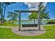 Tranquil outdoor swing with a view of the neighborhood lake at 1581 Culbertson Ave., Myrtle Beach, SC 29577